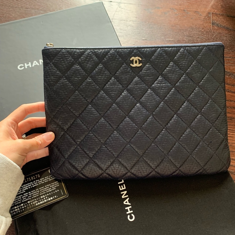 - Chanel O Case Clutch